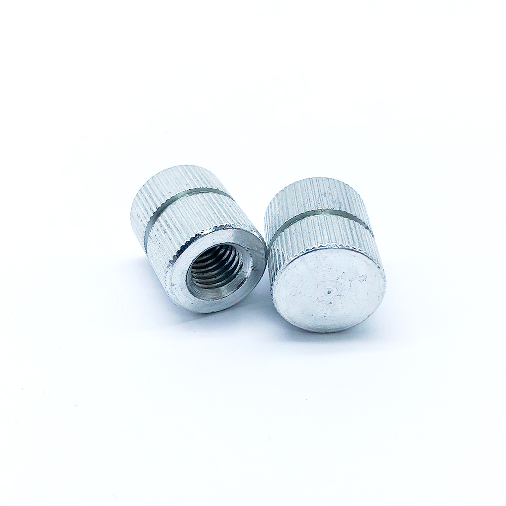 Embedded Nut with Embossed Inlay