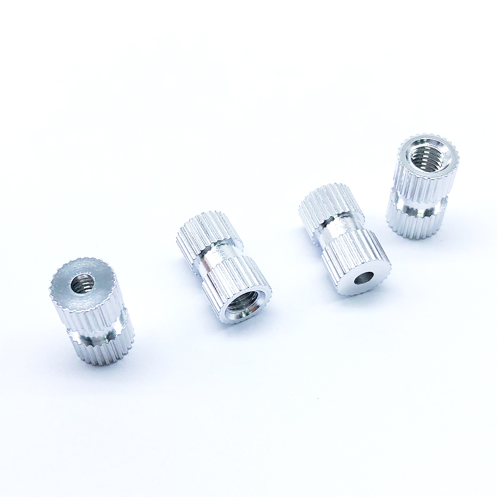 Embedded Nut with Embossed Inlay