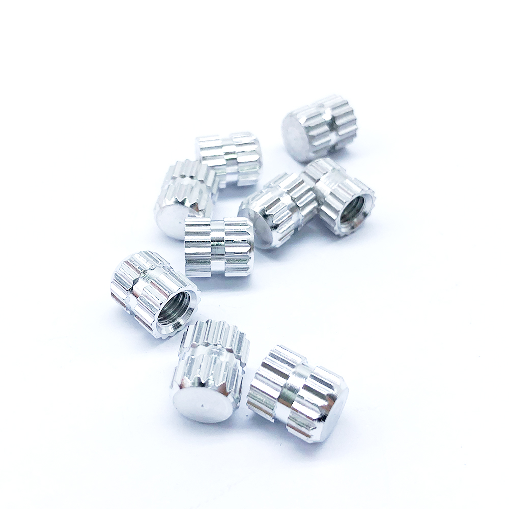 Embedded Nut with Embossed Inlay